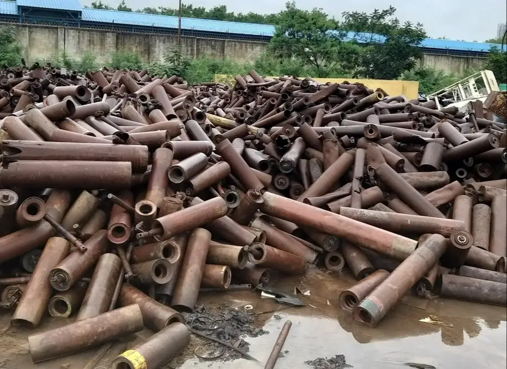 MS Pipe Scrap Buyer in Hyderabad handling heavy steel pipes
