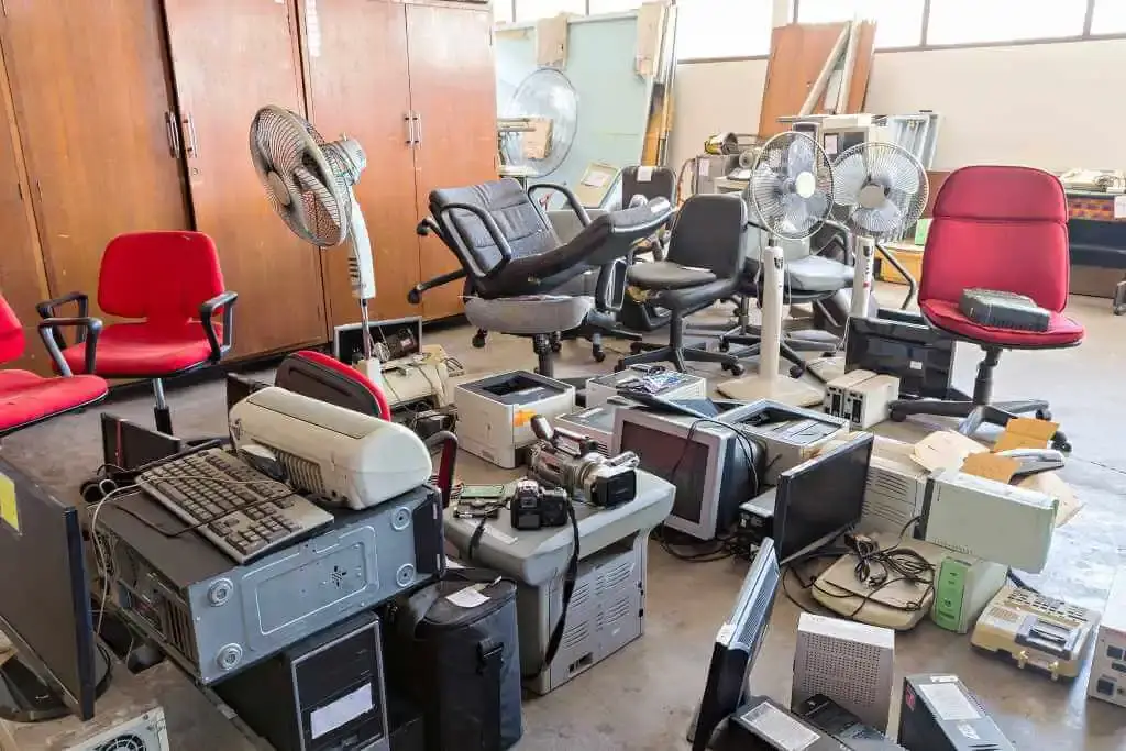 Office scrap buyer in Hyderabad clearing old furniture and IT equipment from a corporate office